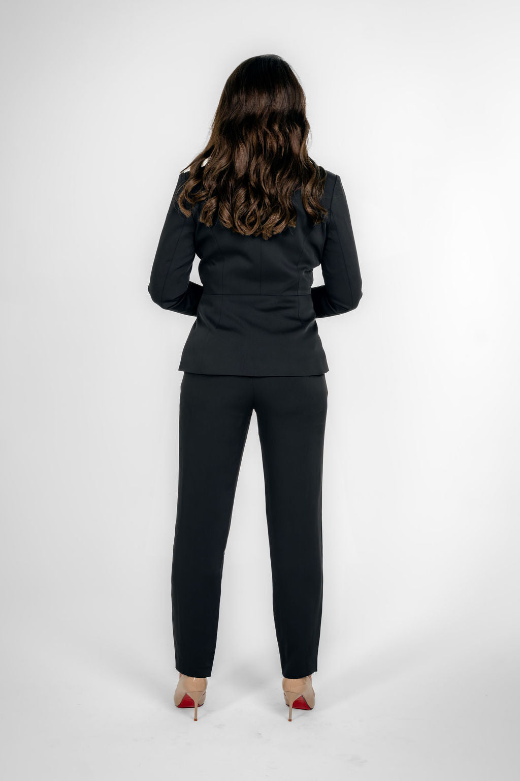 Woman wearing a black chain jacket
