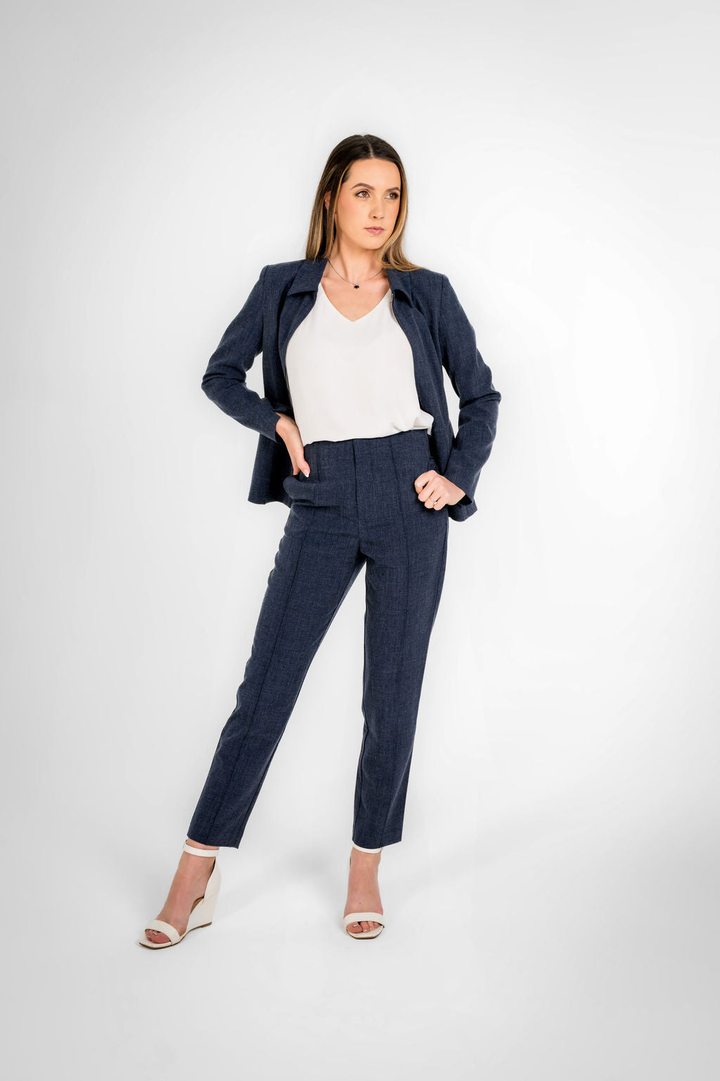 Woman wearing a navy blue straight pant 